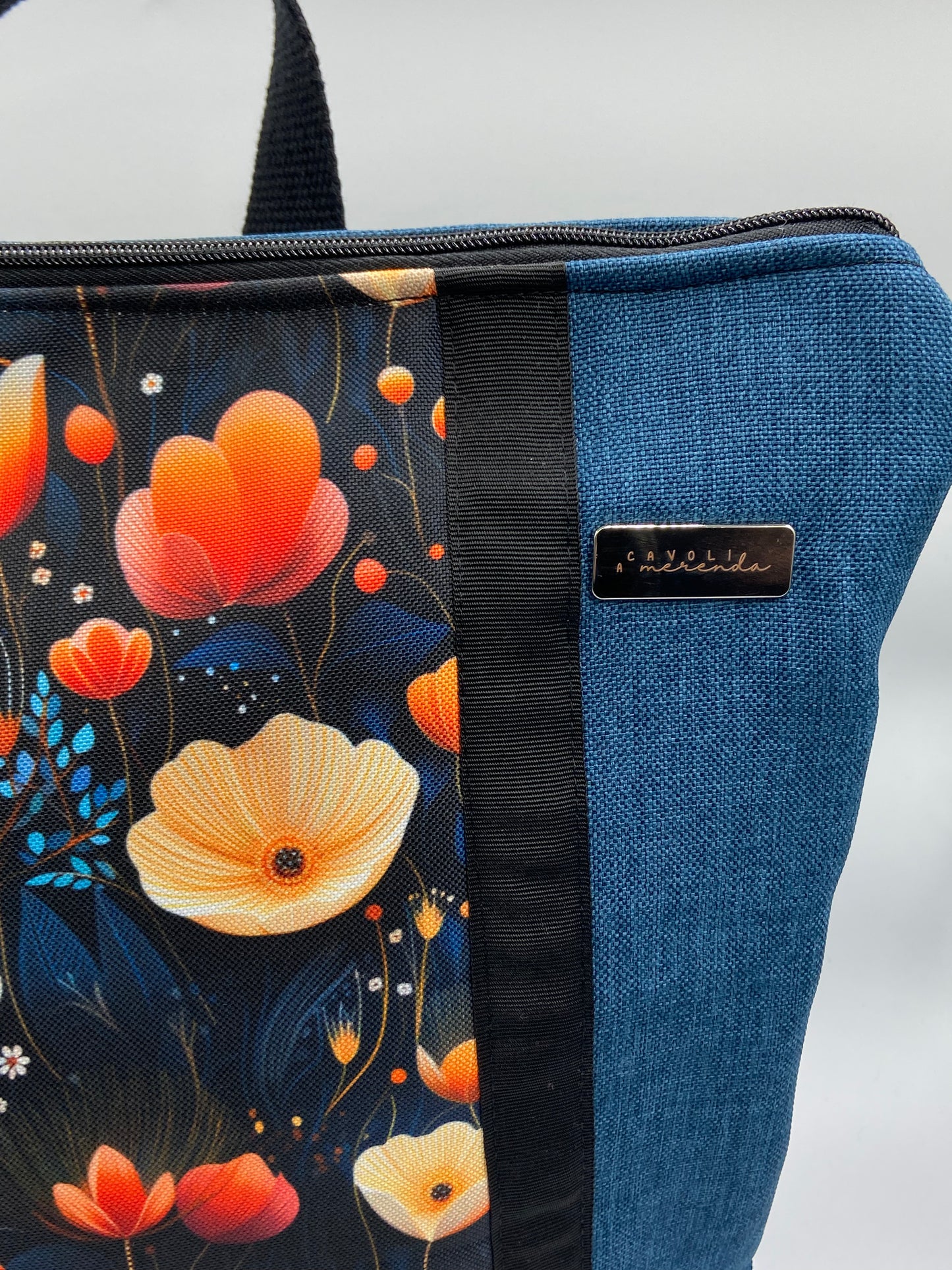 Borsa zaino Zena blu fiori arancioni